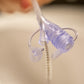 Cleaning brush for enteral feeding tubes